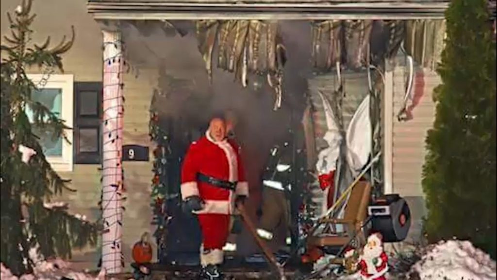 Firefighter battles Old Bridge, New Jersey house fire while dressed as Santa Claus