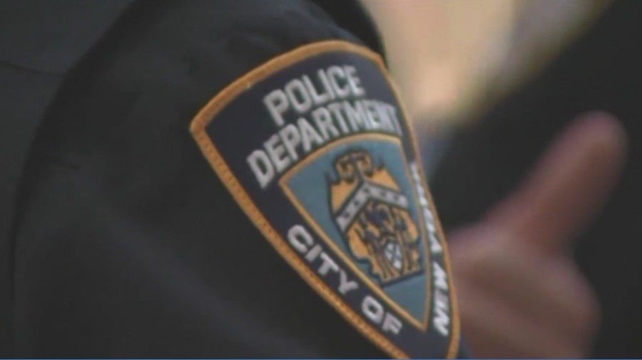 NYPD officer seen on tape planting evidence in weapons case: Queens DA NYPD officer seen on tape planting evidence in weapons case: Queens DA