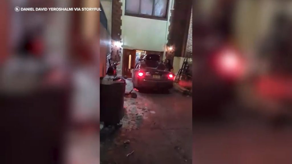 Shocking video shows car slamming into Chabad World Headquarters in Crown Heights, Brooklyn; police take driver into custody