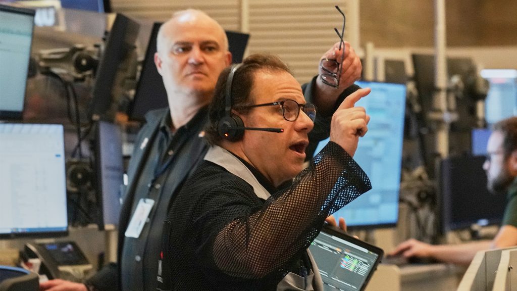 Wall Street drops from its records and oil prices jump after fighting flares in the Middle East