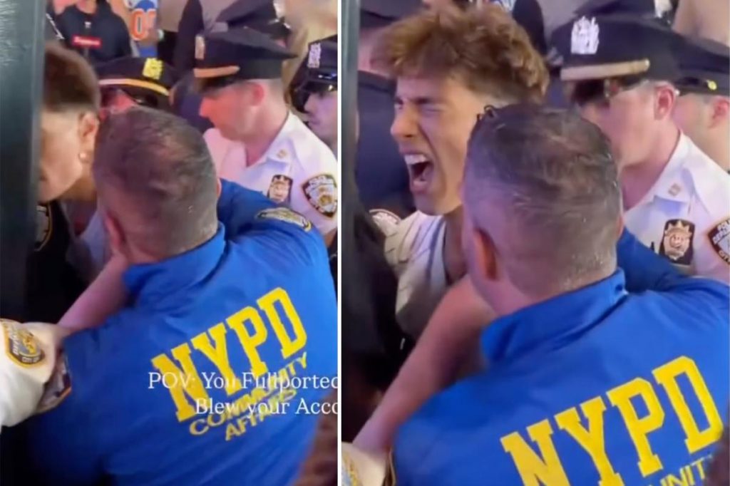 NYPD cop appears to slam Knicks fan head into pole during arrest at Madison Square Garden celebration: video NYPD cop appears to slam Knicks fan head into pole during arrest at Madison Square Garden celebration: video