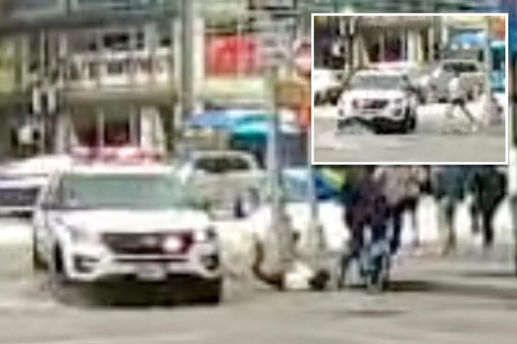 NYPD patrol car collides with jogger during emergency response at Columbus Circle, wild video shows