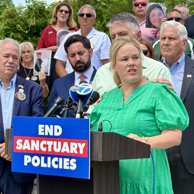Partisan rift deepens over NY immigration law Partisan rift deepens over NY immigration law